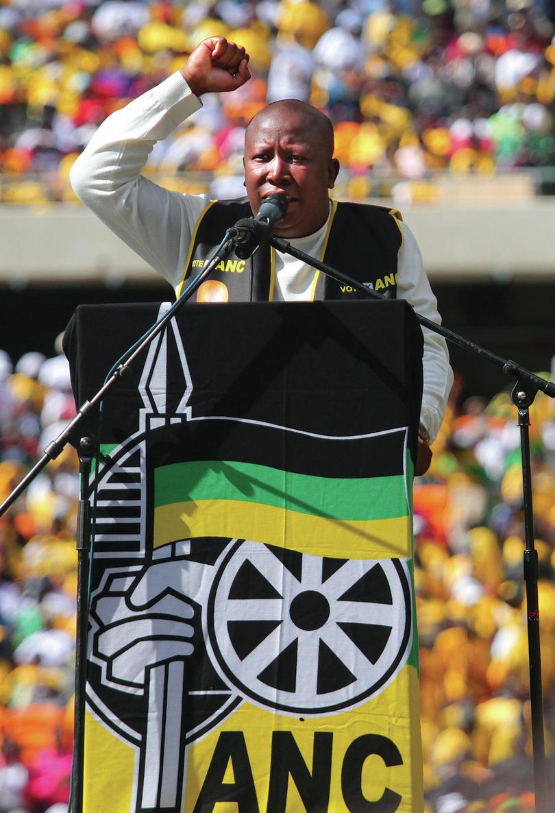 Then ANCYL President, Julius Malema, commanding the stage and monopolising the media coverage. Soweto, May 2011. (EPA/Kim Ludbrook)